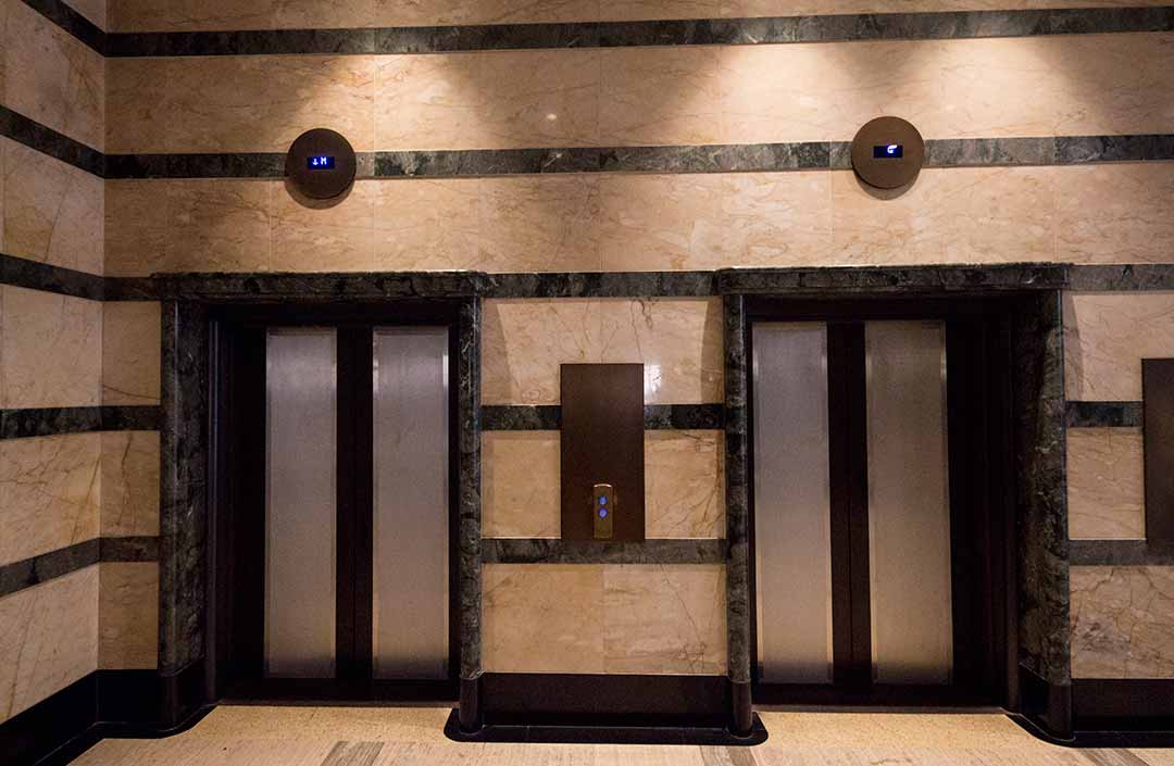 Image of the marble lift lobby at the Primus Hotel